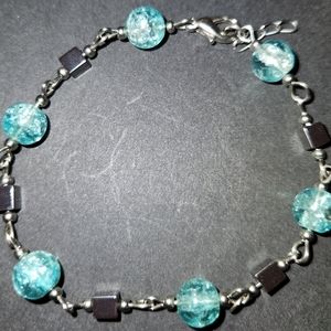 Silver tone and blue beaded bracelet